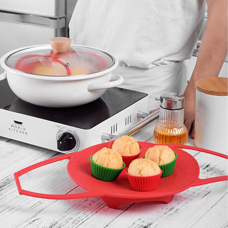 https://pjkitchenaccessories.com/cdn/shop/products/3_Food-Grade-Silicone-Foldable-Microwave-Steamers-Steaming-Rack-Vegetable-Fruit-Bread-Basket-Kitchen-Tools-Gadgets.jpg?v=1588389559